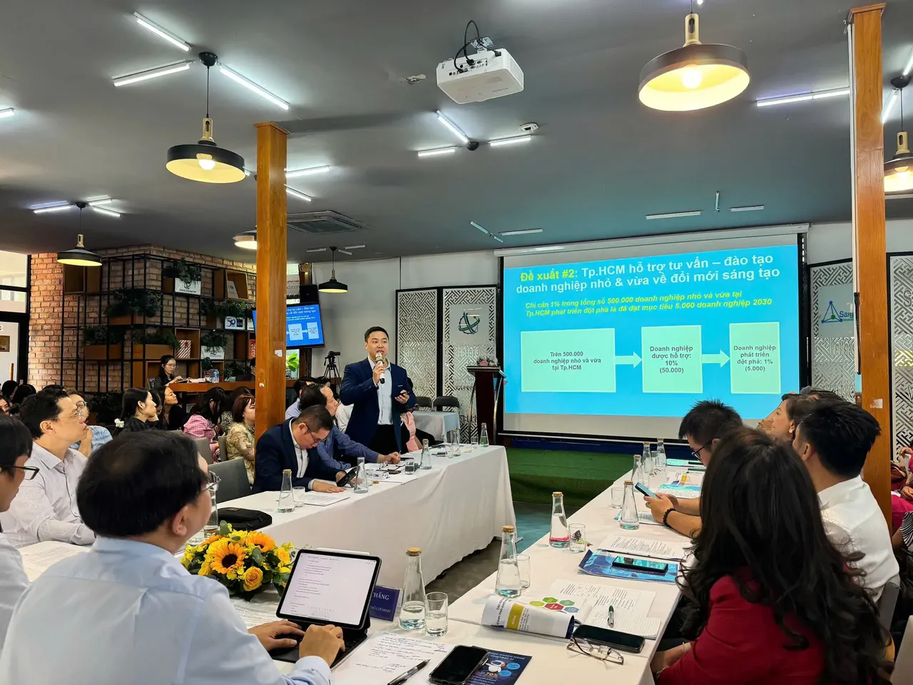 Ông Phạm Tuấn Anh, đại diện TMA trình bày về đề xuấtcho chương trình đổi mới sáng tạo của Thành phố.